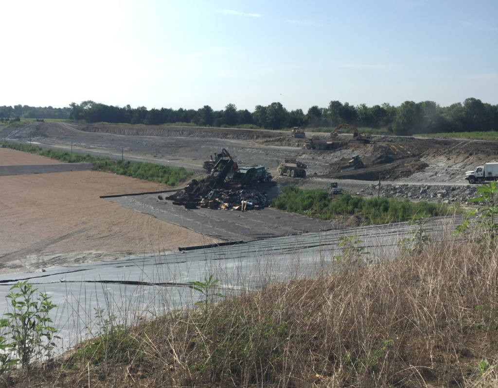 Trash is disposed of in the landfill cell's felt layer.